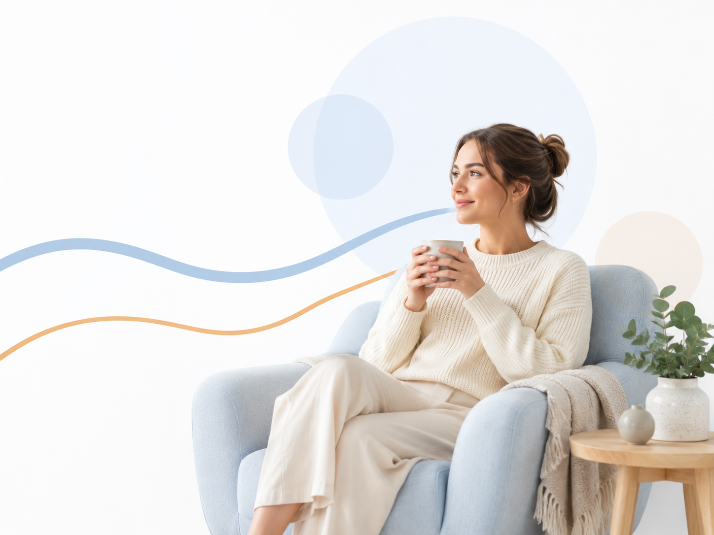 A calm person sitting comfortably with a warm drink beside soft blue and sand-coloured waves